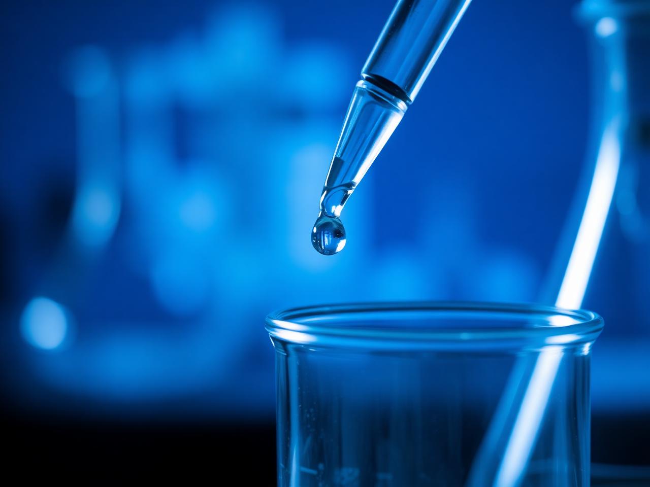 Pipette dropping into beaker